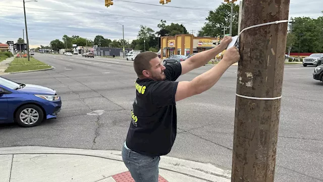 In fight against blight, Detroit cracks down on business owners who illegally post signs