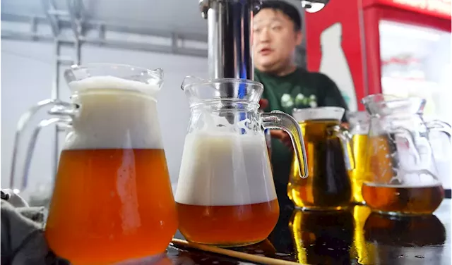 China's beer market, the world's largest, set for bounce as drinkers go high-end