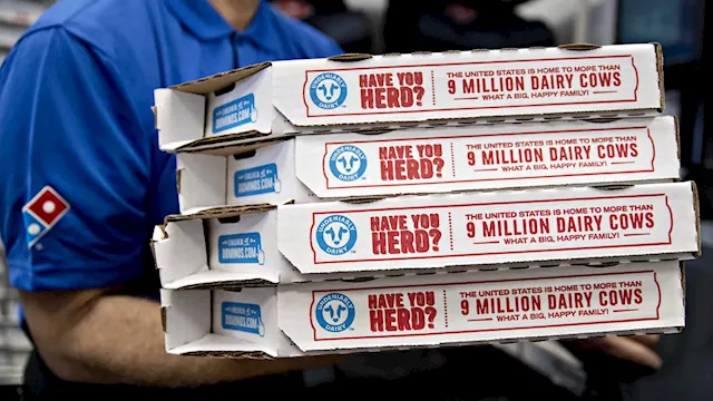 Stocks making the biggest moves premarket: Domino's, Warner Bros. Discovery, United Airlines and more