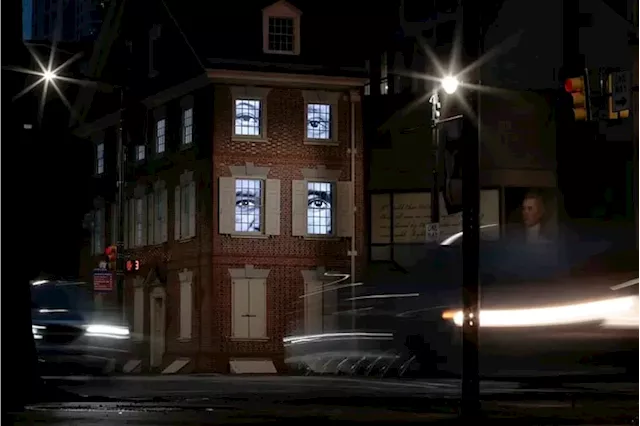 The glowing eyes on Market Street represent the hidden history of Thomas Jefferson’s enslaved valet, Robert Hemmings