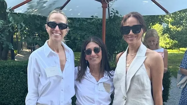 Meghan Markle suits up for high-powered business summit in the Hamptons after flying into New York...