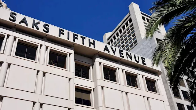 Saks Fifth Avenue's parent company to buy rival Neiman Marcus