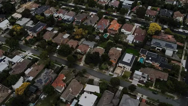 House prices in Melbourne, Hobart and Darwin drop as the national market swells slowly