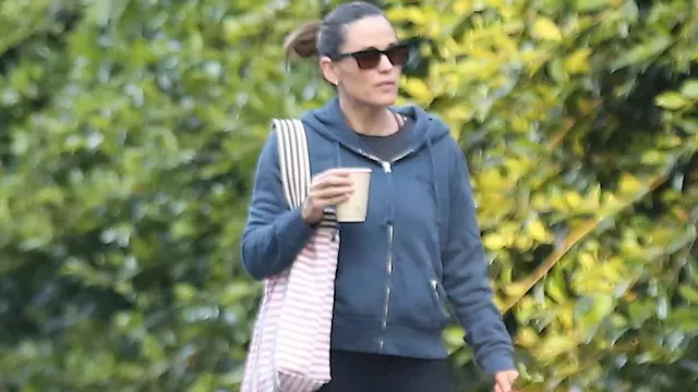 Jennifer Garner cuts a casual figure in a jacket and leggings as she hits the farmers market with...