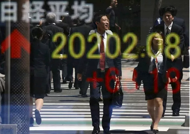 Asian stocks muted ahead of economic data; Japan surges in catch-up trade