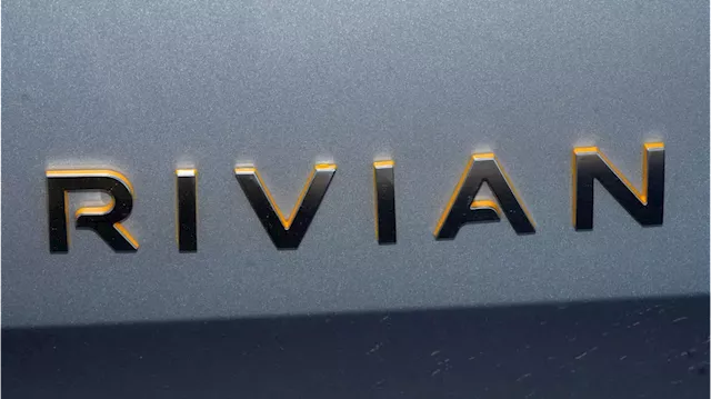 Rivian stock falls on $1.4B loss reported in mixed earnings