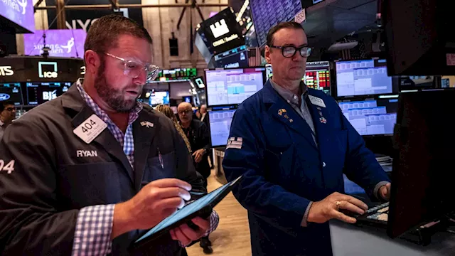 Stocks At Night: Fed Cuts Rates, Gold Climbs As Market Looks Ahead