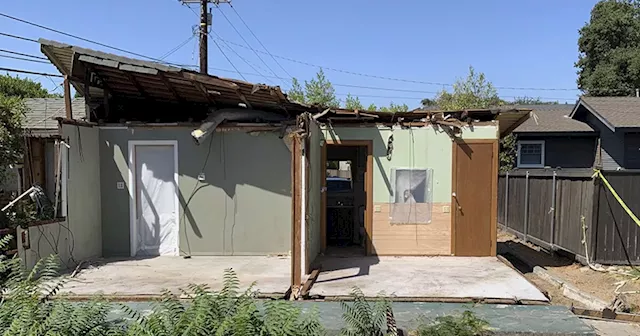 Half a house for half a million dollars: Home crushed by tree hits market near Los Angeles