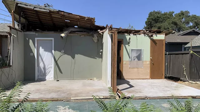 Half a house for half a million dollars: Home crushed by tree hits market near Los Angeles