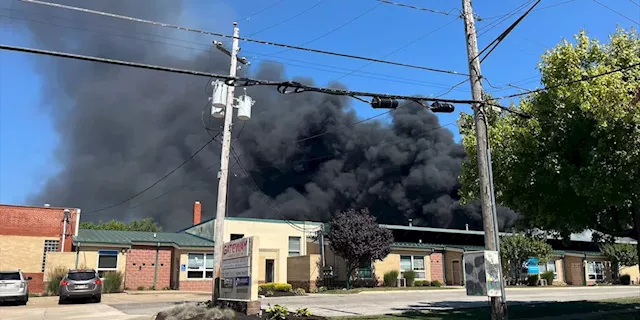 Evacuations underway in Akron due to HAZMAT fire at commercial business