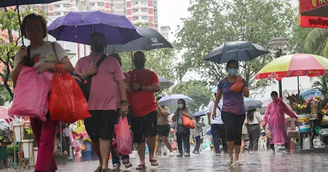 Cancelled activities, business closures, dancing in the rain - Singapore contends with non-stop rain