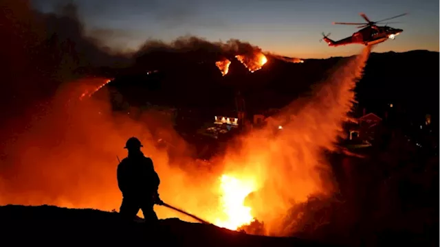 Top financial watchdog warns climate change set to trigger market panics